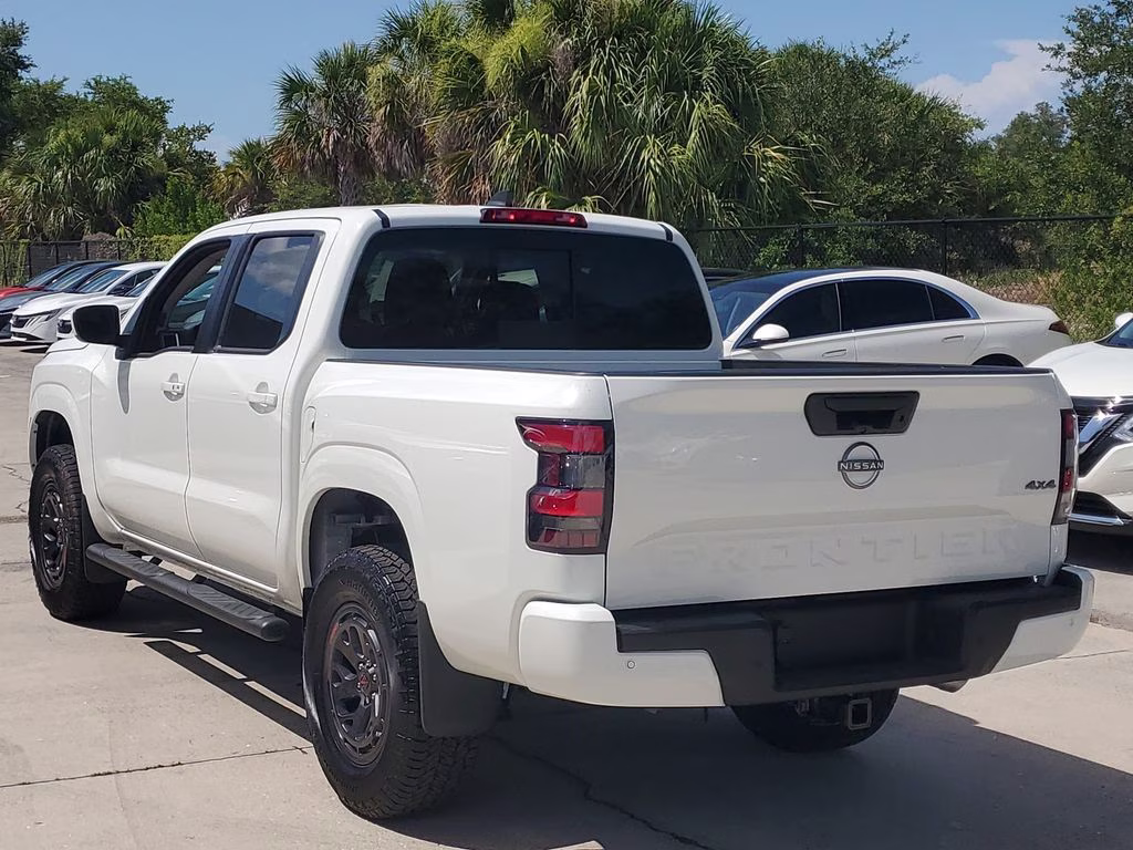 2026 Glacier White Nissan Frontier SV 4X4 Truck