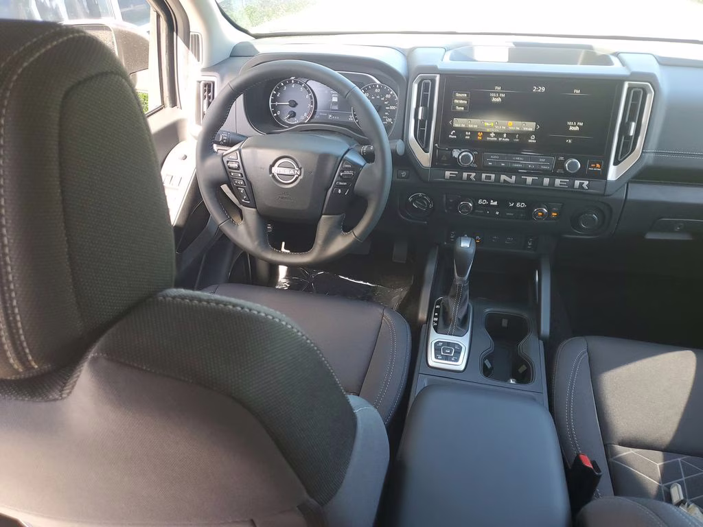 2026 Glacier White Nissan Frontier SV 4X4 Truck