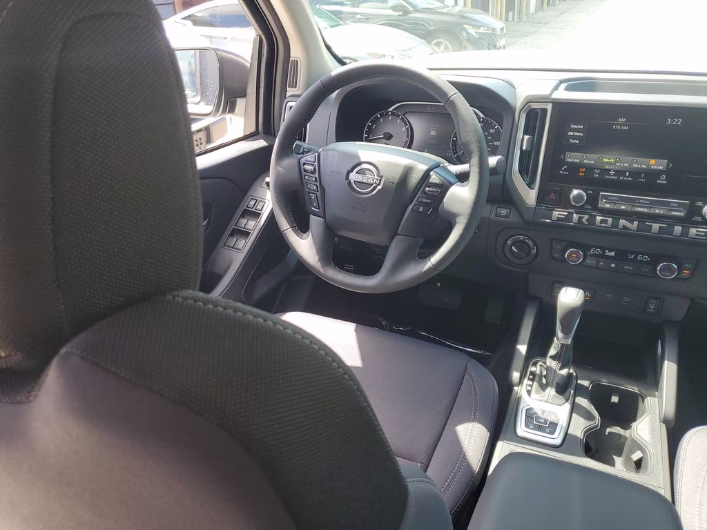 2026 Glacier White Nissan Frontier SV 4X4 Truck