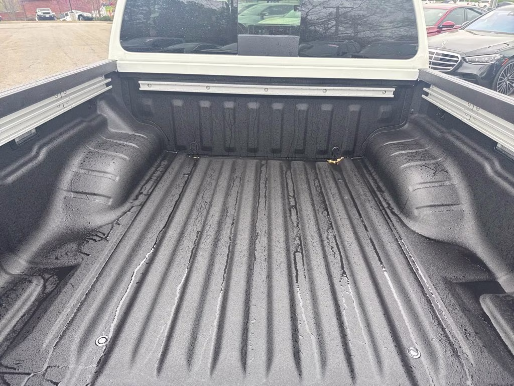 2026 Glacier White Nissan Frontier SV 4X4 Truck