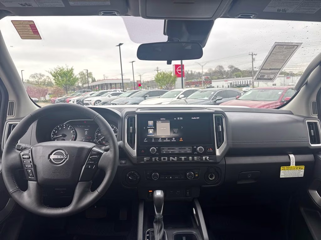 2026 Glacier White Nissan Frontier SV 4X4 Truck