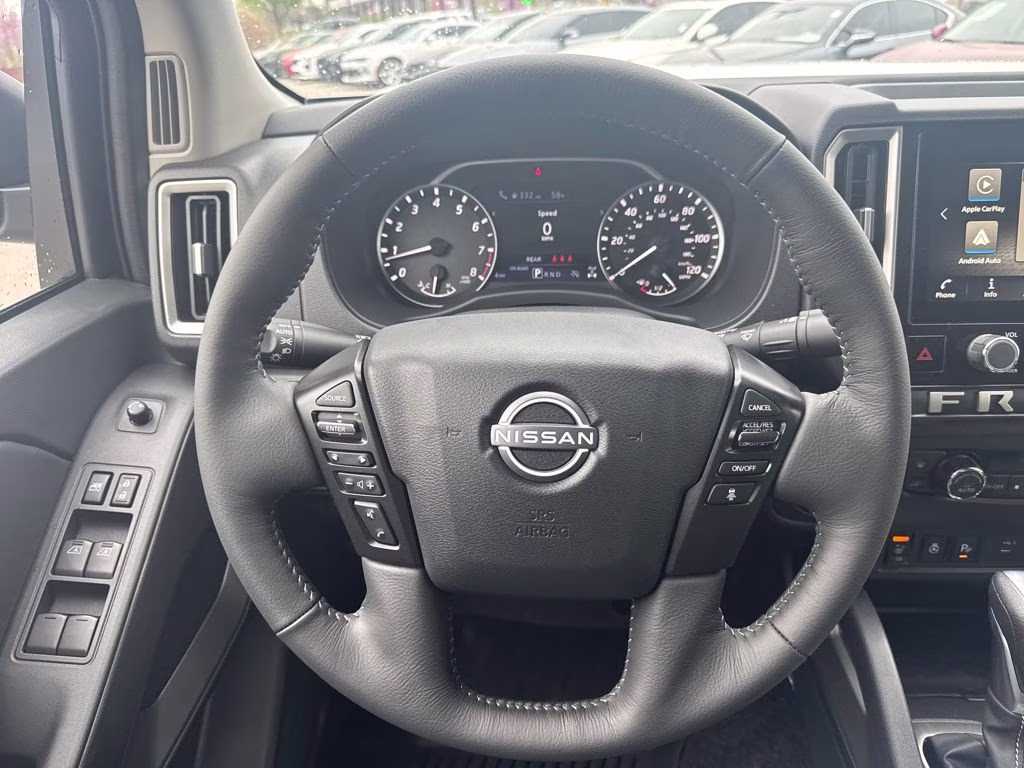 2026 Glacier White Nissan Frontier SV 4X4 Truck