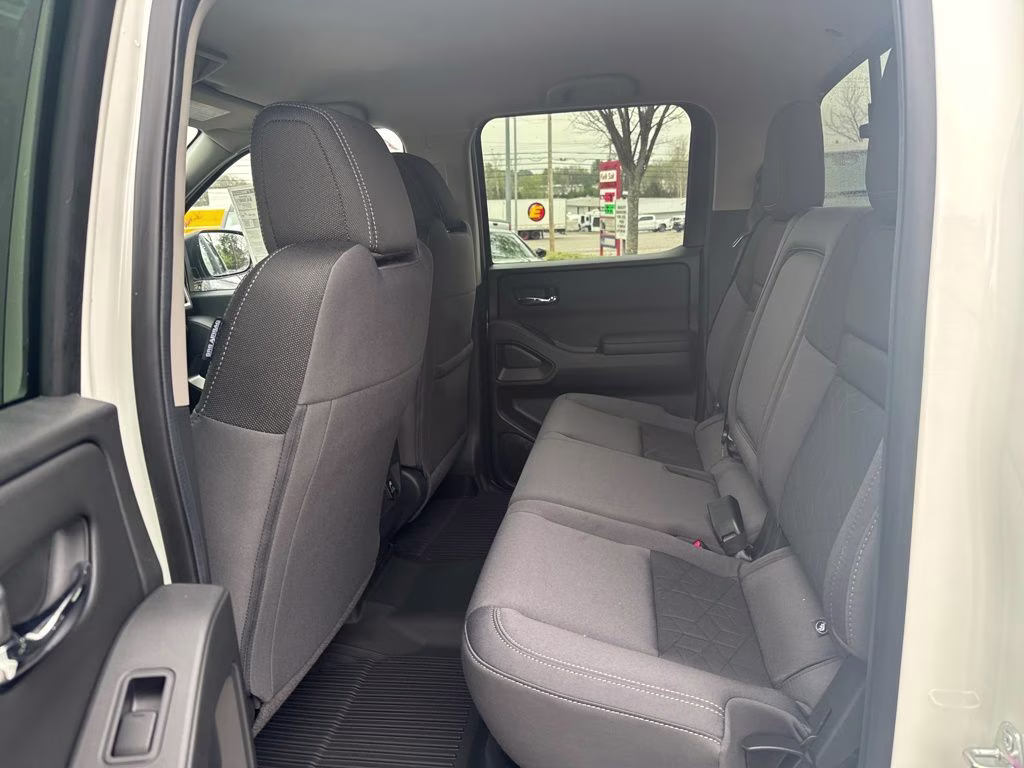 2026 Glacier White Nissan Frontier SV 4X4 Truck