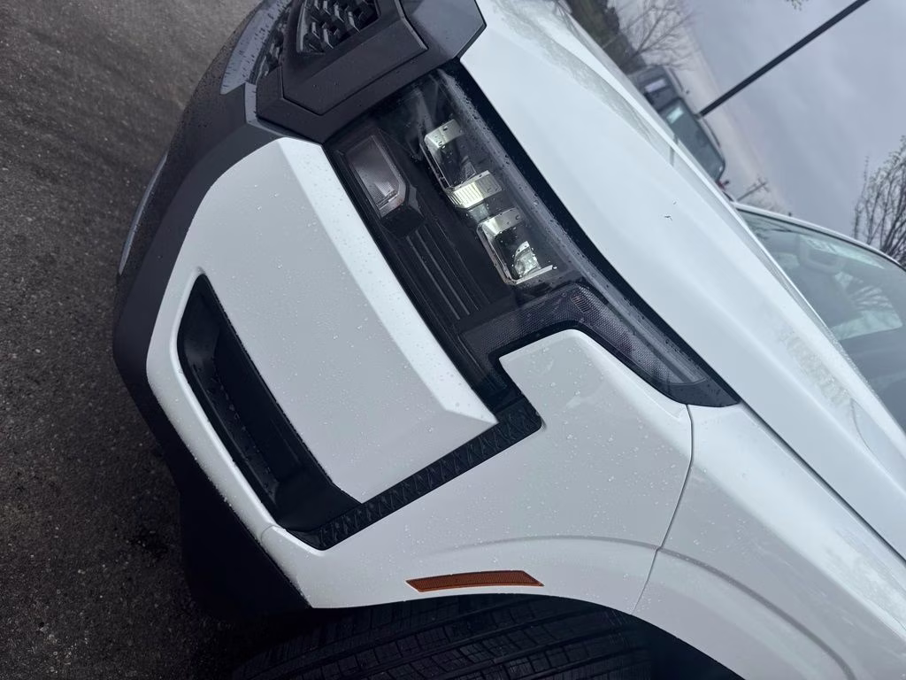 2026 Glacier White Nissan Frontier SV 4X4 Truck