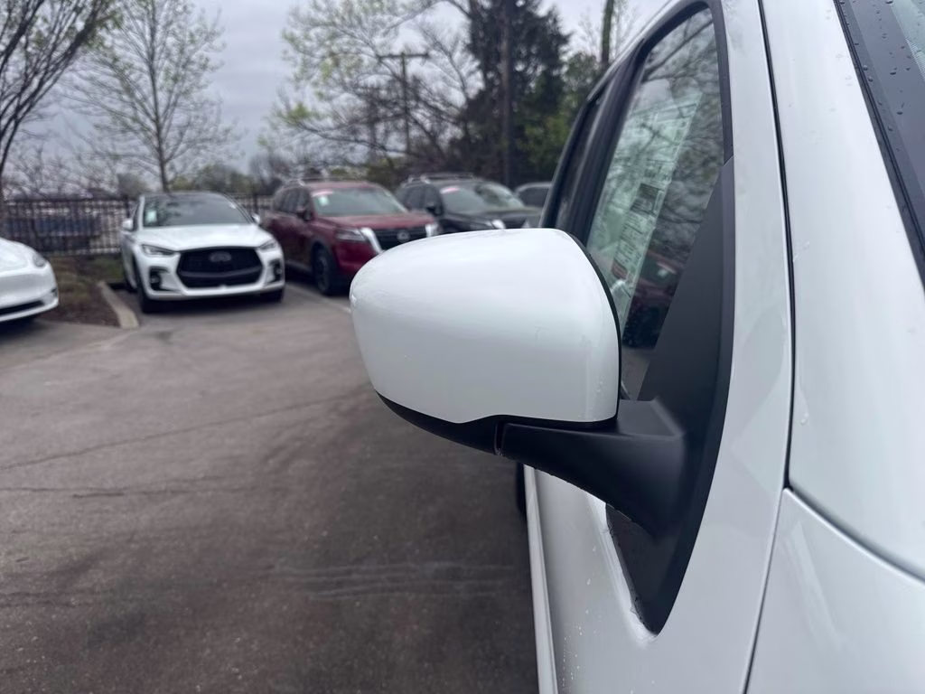 2026 Glacier White Nissan Frontier SV 4X4 Truck