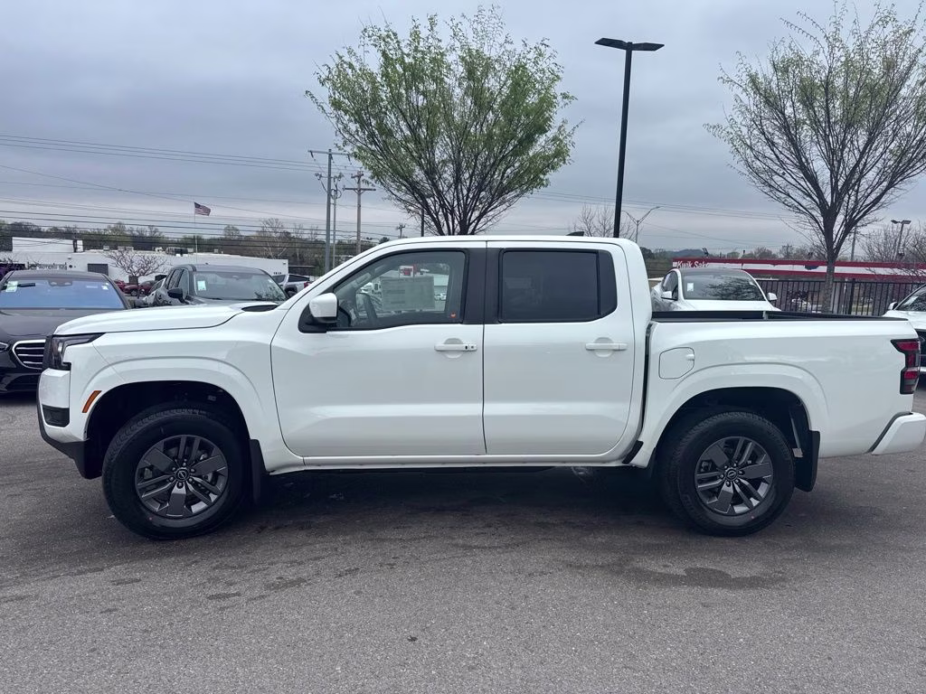 2026 Glacier White Nissan Frontier SV 4X4 Truck