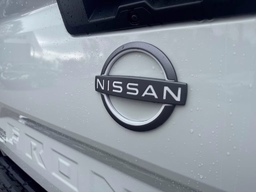 2026 Glacier White Nissan Frontier SV 4X4 Truck
