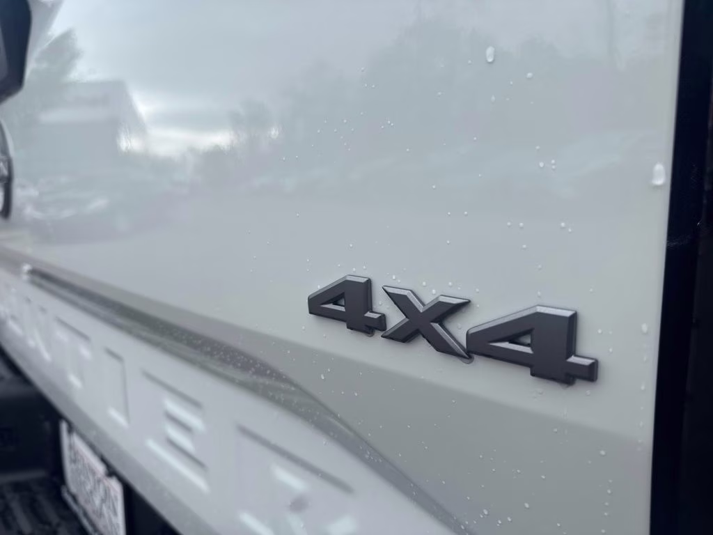 2026 Glacier White Nissan Frontier SV 4X4 Truck