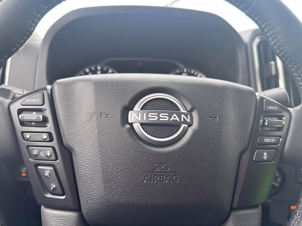 2026 Glacier White Nissan Frontier SV 4X4 Truck
