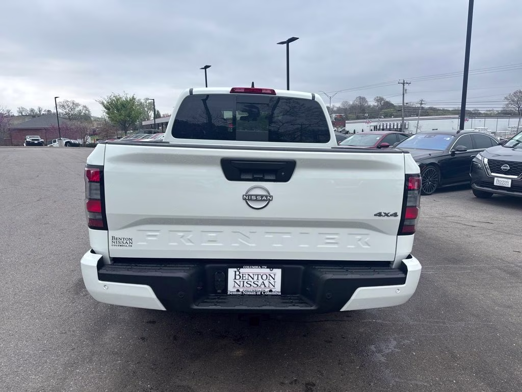 2026 Glacier White Nissan Frontier SV 4X4 Truck