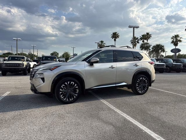 2025 Champagne Silver Metallic Nissan Rogue Platinum FWD SUV