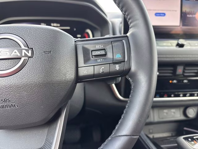 2025 Champagne Silver Metallic Nissan Rogue Platinum FWD SUV