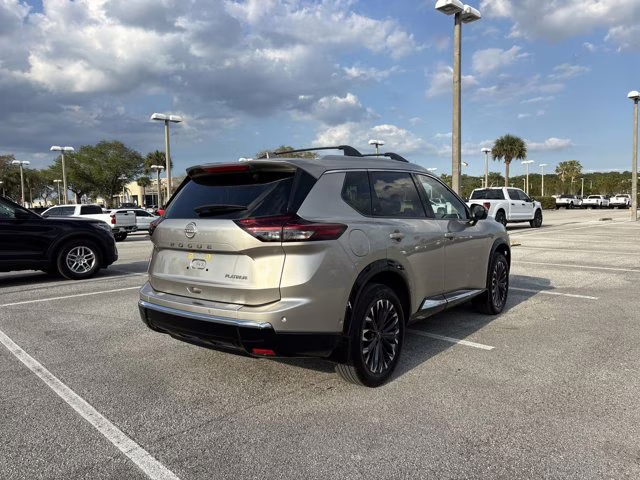 2025 Champagne Silver Metallic Nissan Rogue Platinum FWD SUV