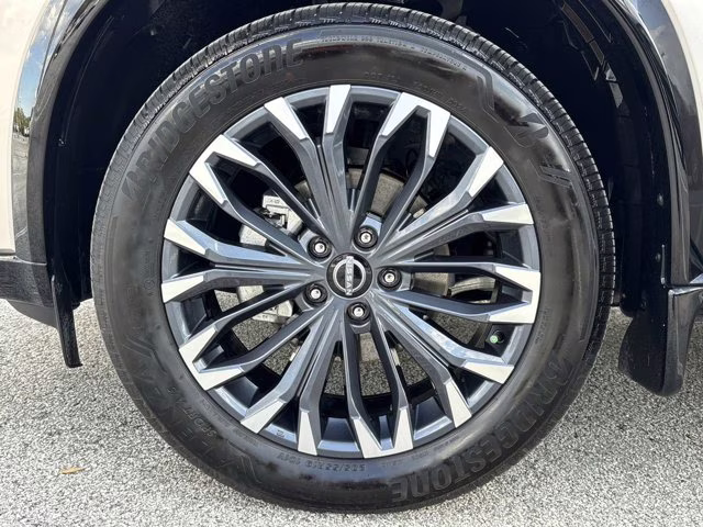 2025 Champagne Silver Metallic Nissan Rogue Platinum FWD SUV