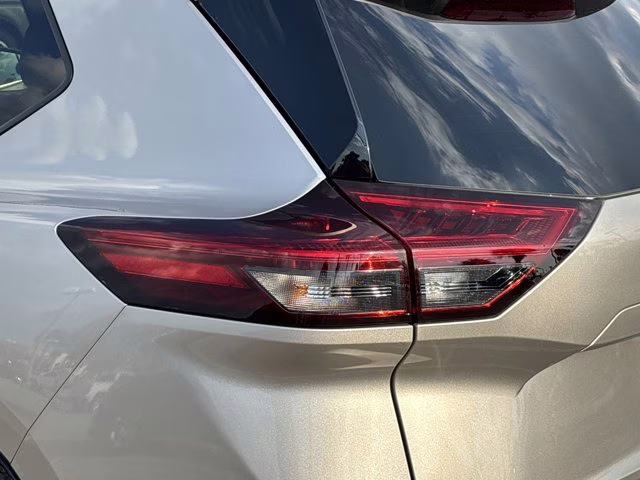 2025 Champagne Silver Metallic Nissan Rogue Platinum FWD SUV