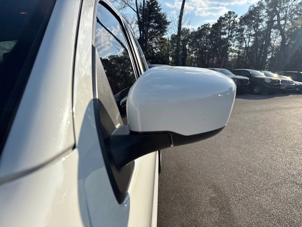 2024 Glacier White Nissan Frontier SV 4X4 Truck