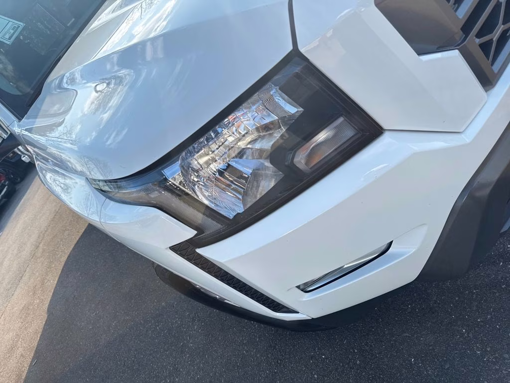 2024 Glacier White Nissan Frontier SV 4X4 Truck