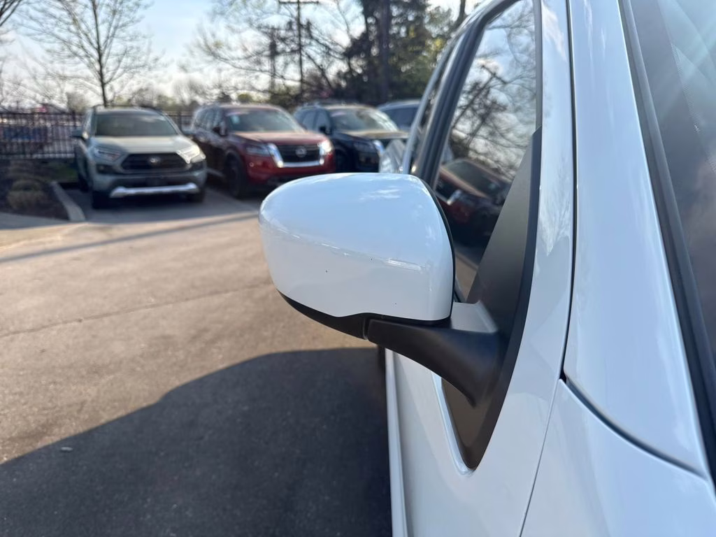 2024 Glacier White Nissan Frontier SV 4X4 Truck