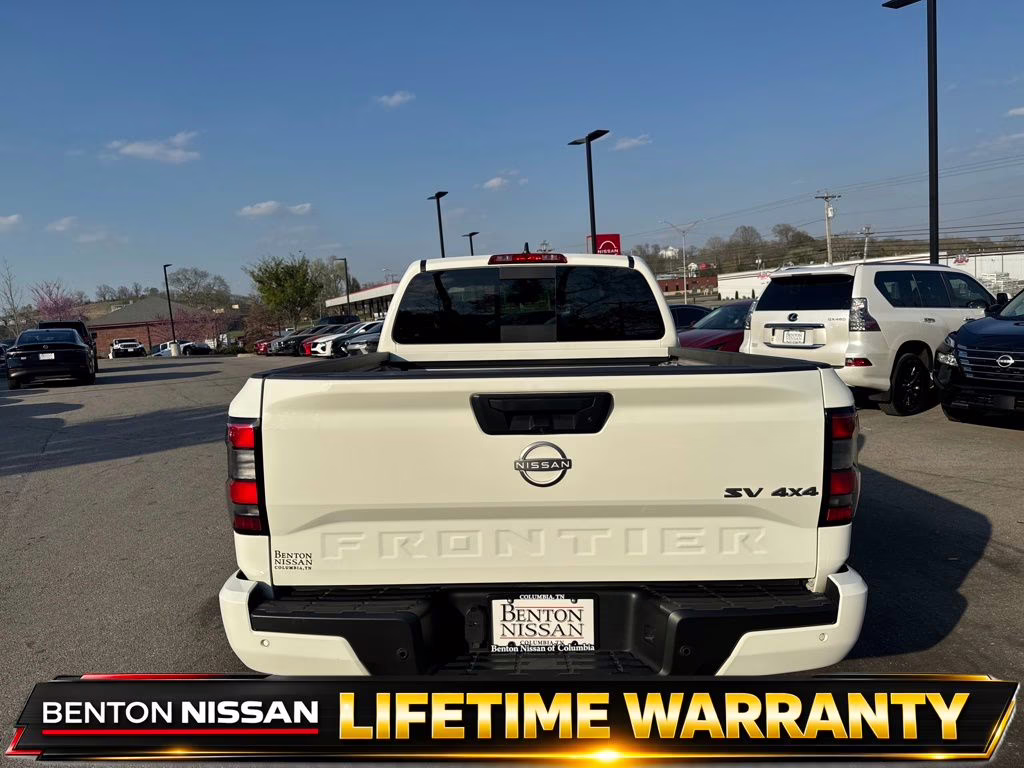 2024 Glacier White Nissan Frontier SV 4X4 Truck
