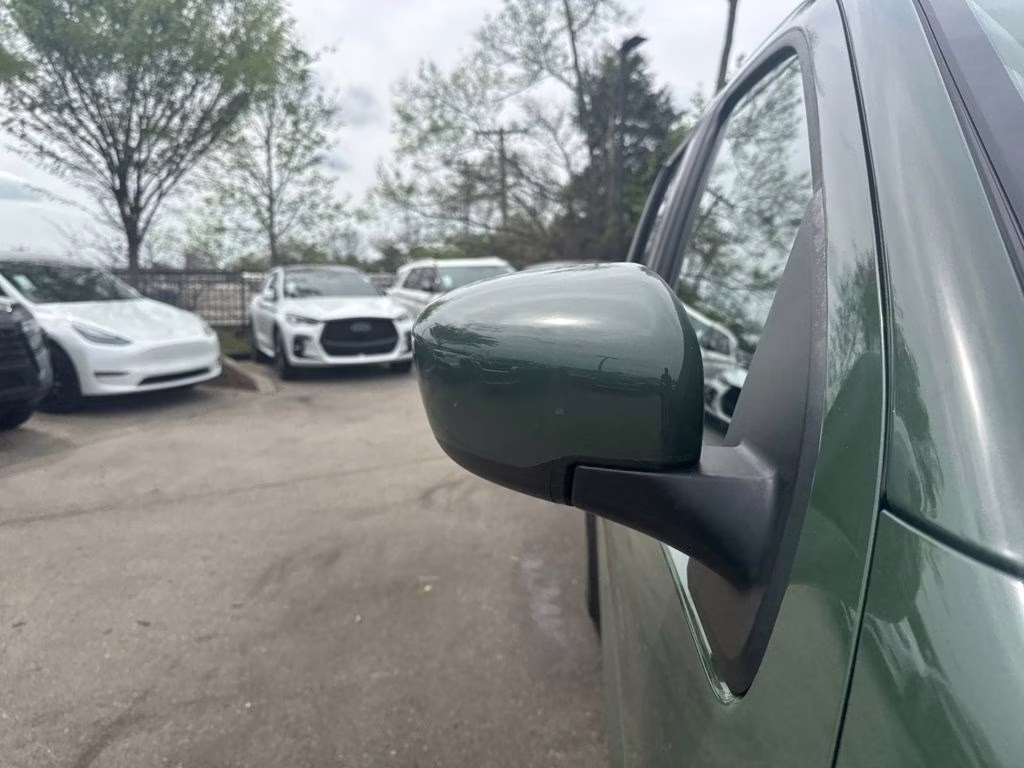 2024 Tactical Green Metallic Nissan Frontier SL RWD Truck
