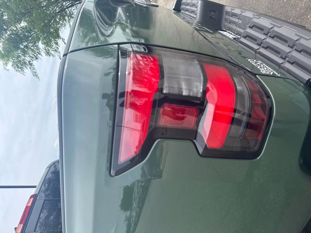 2024 Tactical Green Metallic Nissan Frontier SL RWD Truck