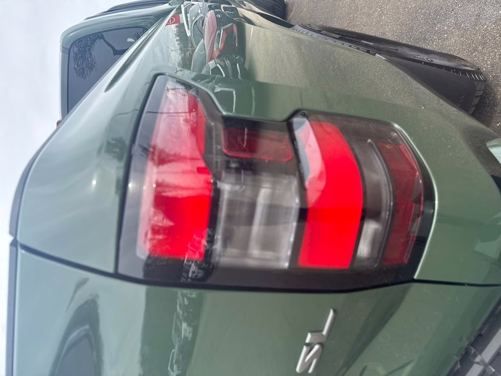 2024 Tactical Green Metallic Nissan Frontier SL RWD Truck
