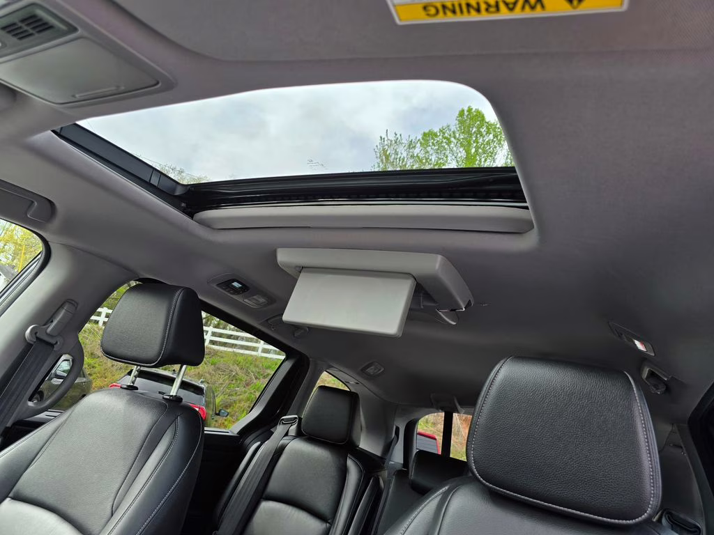 2023 Modern Steel Metallic Honda Odyssey Touring FWD Van