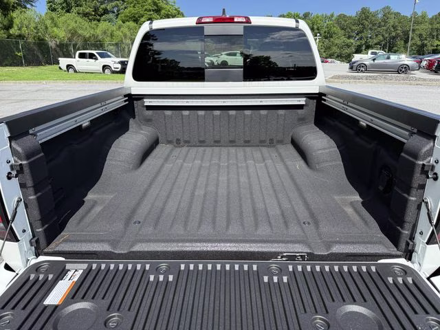2025 Glacier White Nissan Frontier SV RWD Truck
