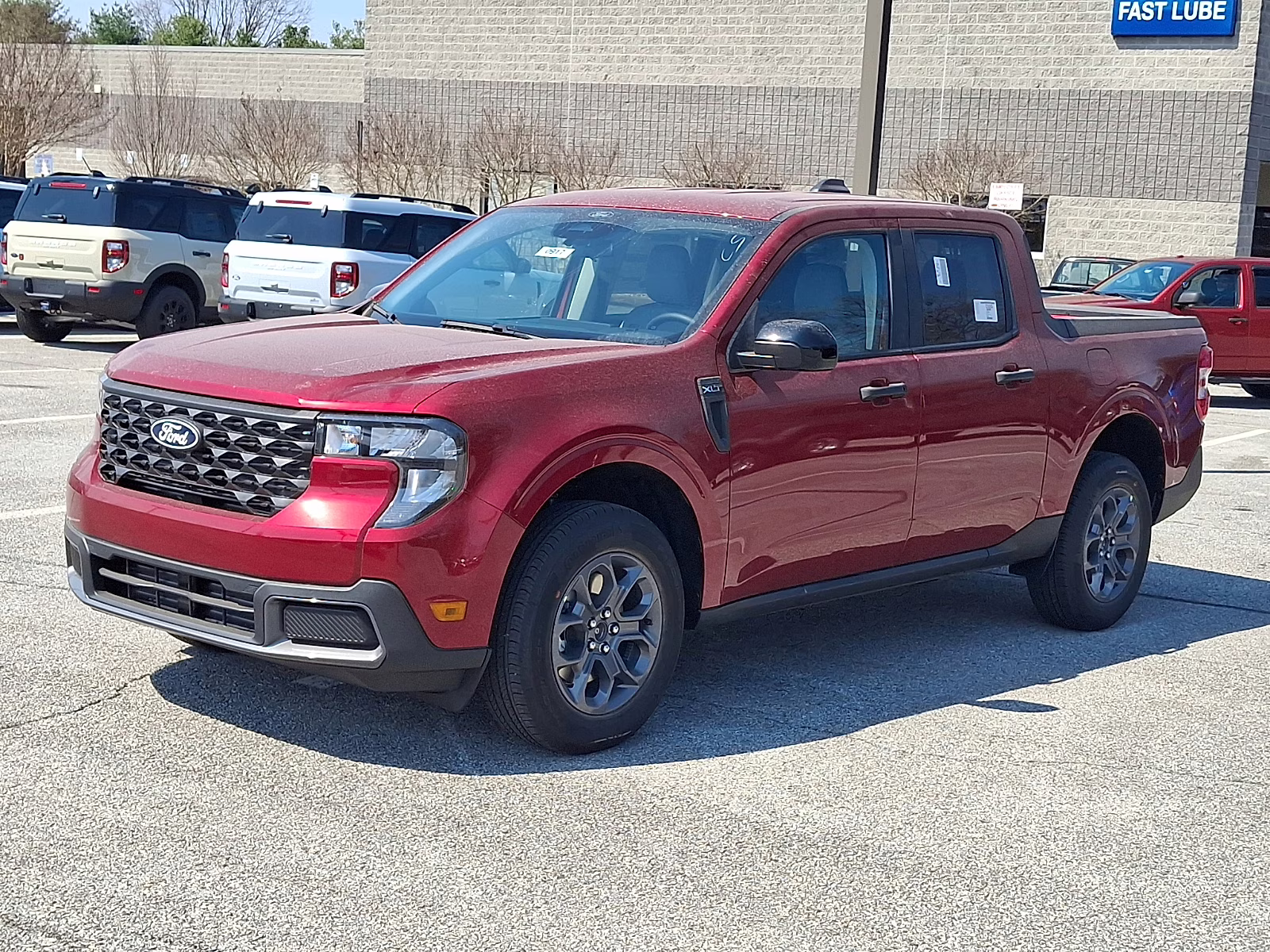2026 Ruby Red Metallic Tinted Clearcoat - RR Ford Maverick XLT AWD