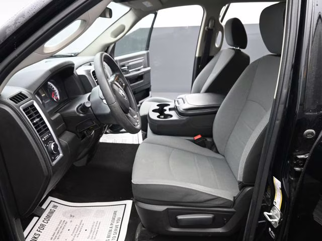 2024 Diamond Black Crystal Pearlcoat Ram 1500 Classic SLT 4X4 Truck