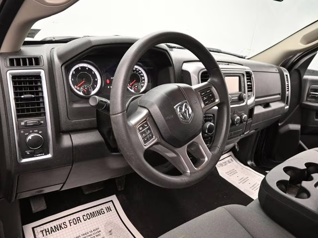 2024 Diamond Black Crystal Pearlcoat Ram 1500 Classic SLT 4X4 Truck