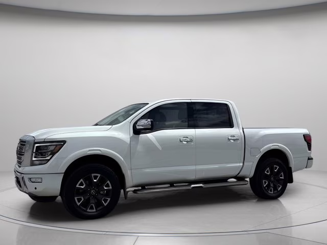 2023 Pearl White Nissan Titan Platinum Reserve 4X4 Truck