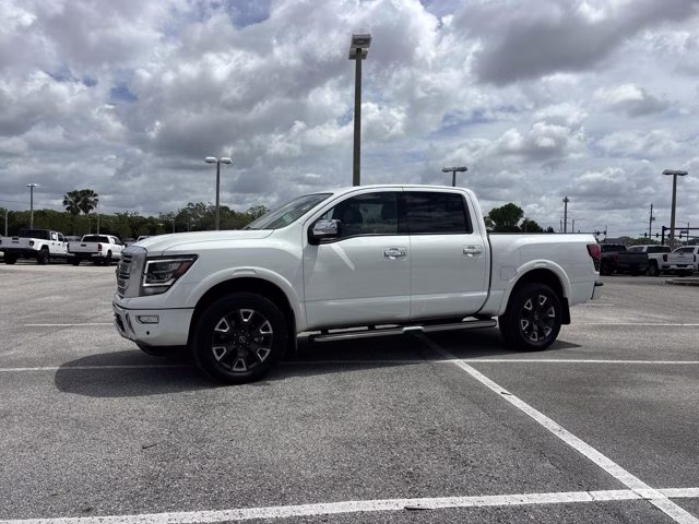 2023 Pearl White Nissan Titan Platinum Reserve 4X4 Truck