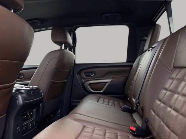 2023 Pearl White Nissan Titan Platinum Reserve 4X4 Truck