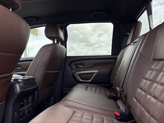 2023 Pearl White Nissan Titan Platinum Reserve 4X4 Truck
