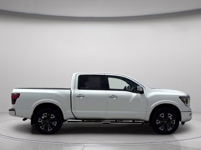 2023 Pearl White Nissan Titan Platinum Reserve 4X4 Truck
