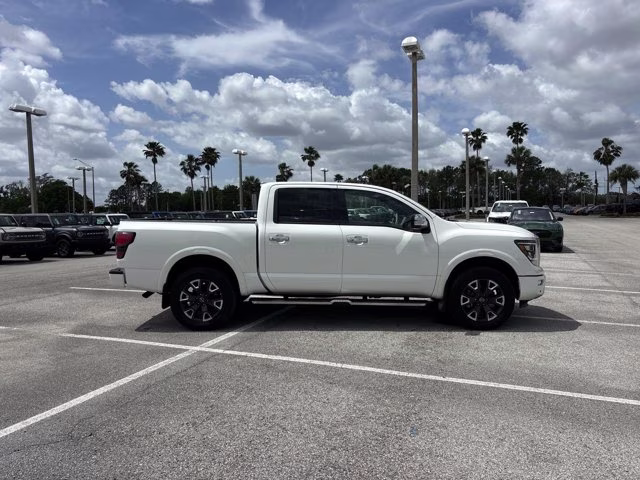 2023 Pearl White Nissan Titan Platinum Reserve 4X4 Truck