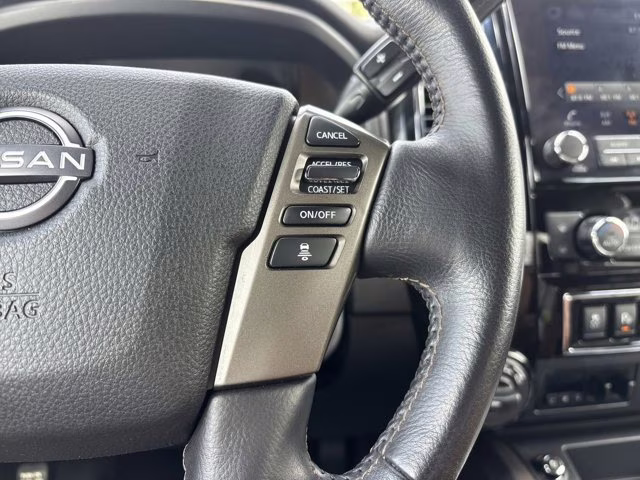 2023 Pearl White Nissan Titan Platinum Reserve 4X4 Truck