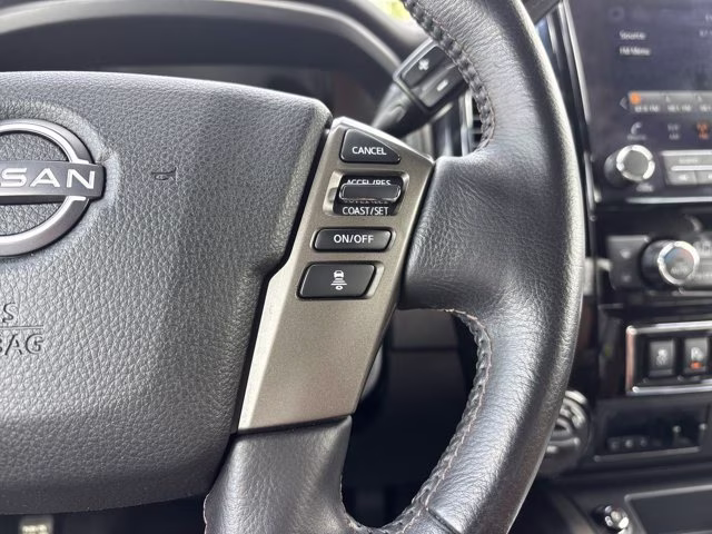 2023 Pearl White Nissan Titan Platinum Reserve 4X4 Truck