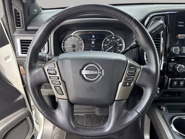 2023 Pearl White Nissan Titan Platinum Reserve 4X4 Truck
