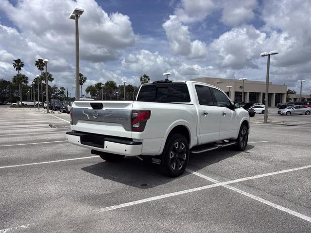 2023 Pearl White Nissan Titan Platinum Reserve 4X4 Truck