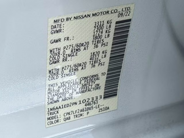 2023 Pearl White Nissan Titan Platinum Reserve 4X4 Truck