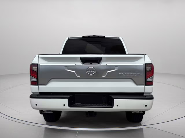 2023 Pearl White Nissan Titan Platinum Reserve 4X4 Truck