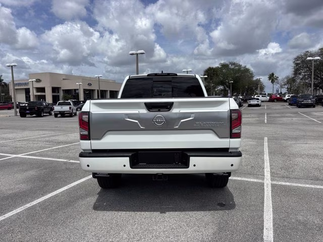2023 Pearl White Nissan Titan Platinum Reserve 4X4 Truck