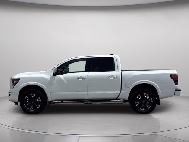 2023 Pearl White Nissan Titan Platinum Reserve 4X4 Truck