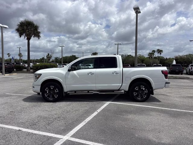 2023 Pearl White Nissan Titan Platinum Reserve 4X4 Truck