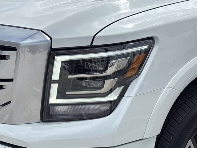 2023 Pearl White Nissan Titan Platinum Reserve 4X4 Truck