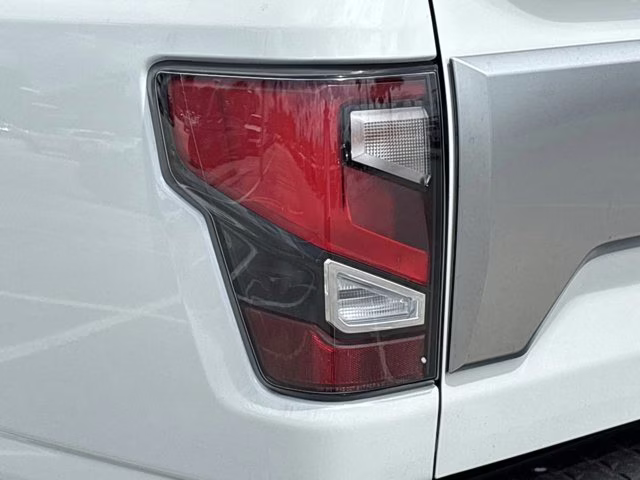 2023 Pearl White Nissan Titan Platinum Reserve 4X4 Truck