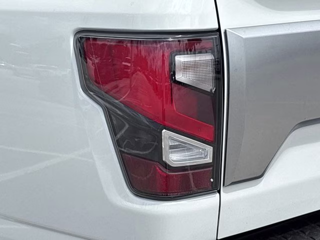 2023 Pearl White Nissan Titan Platinum Reserve 4X4 Truck