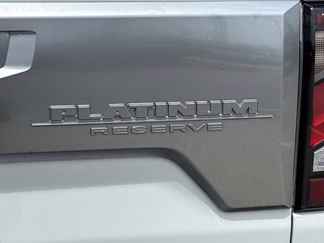 2023 Pearl White Nissan Titan Platinum Reserve 4X4 Truck